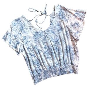 Small blue and white floral top, v-neck with ties